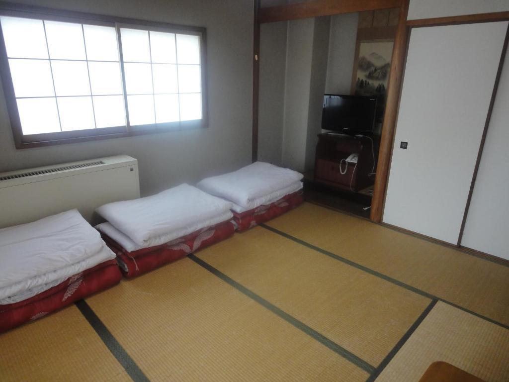 Ryokan Tanada Хиросима Экстерьер фото
